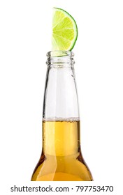 Mexican beer bottle with lime slice and frost on white background