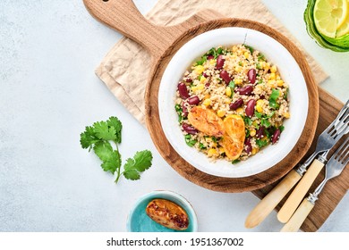 Mexican Black Bean Corn Quinoa Salad With Caramelized Lemon In Old Vintage Clay Bowl On A Light Gray Concrete Background. Traditional Mexican Cuisine Dish. Top View, Mock Up.