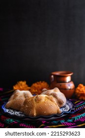 Mexican bread on Altar with sugar skull and hot chocolate traditional food for Celebration of Mexico's Day of the Dead - Shutterstock ID 2215293623