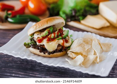 Mexican Burger With Chips And Avocado On Table Food With Ingredients In Mexico
