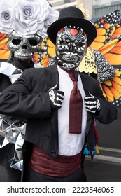 Mexican Catrin or Dandy gentleman in the Day of the Dead festival.
Elegant masked man representing the way a deceased relative used to wear.
 - Shutterstock ID 2223546065
