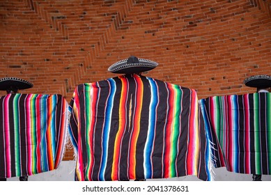  Mexican charro dancer with sombrero and multicolored serape from jalisco mexico with mariachi music
