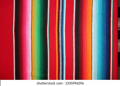 Mexican Cinco De Mayo Poncho Mexico Serape Background Backdrop Dia De Los Muertos Mexican Falsa Blanket Rug Sarape Fiesta Traditional With Stripes Copy Space Backdrop - Stock Photo Photograph