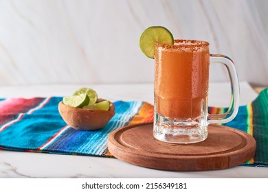 Mexican cocktail, michelada, made with beer and tomato juice.