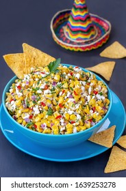 Mexican Corn Appetizer Elote .  Roasted Street Corn Salad Or Dip With сilantro, Lime, Cheese, Mayonnaise And Chili Served With Chips.