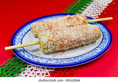 Mexican  Corn Dish. Known in spanish as Elote. Mexican corn dish with mayonnaise, shredded white cheese and piquin chili. Also known in spanish as elote.