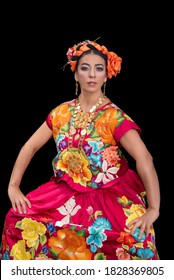 Mexican Dancer From Oaxaca Mexico, Wearing A Costume From The Region Of The Isthmus Of Tehuantepec, Dances In The Guelaguetza De, With A Black Background And A Hand Embroidered Dress, Carries A Heart 