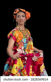 Mexican Dancer From Oaxaca Mexico, Wearing A Costume From The Region Of The Isthmus Of Tehuantepec, Dances In The Guelaguetza De, With A Black Background And A Hand Embroidered Dress, Carries A Heart 