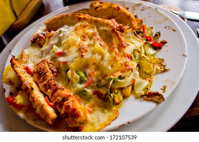 Mexican Dish With Chicken Breast And Cheese
