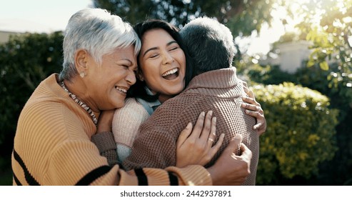 Mexican family, hug and smile for reunion, outdoors and love for support, retirement and care. Elderly parents and daughter, visit and happy in backyard, bonding and embrace for quality time at home - Powered by Shutterstock