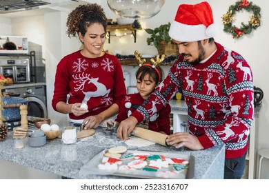 Mexican family mother, father and daughter baking Christmas cookies at home in Mexico Latin America in holidays - Powered by Shutterstock