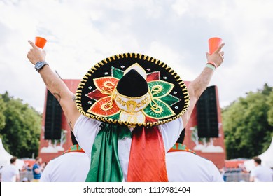 Mexican Fans In Uniform And Sombrero Are Happy For Their Team. Horizontal