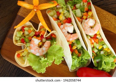 Mexican fast food, Burritos wraps with minced shrimp. - Shutterstock ID 1962058744