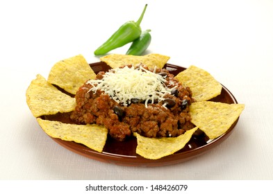 Mexican Food: Cheesy Chili With Meat Served With Nachos