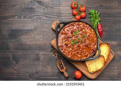 Mexican Food Chile Con Carne Dish On A Wooden Backdrop. Bean And Corn Soup, Red Bean Stew