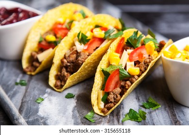 Mexican food - delicious tacos with ground beef - Shutterstock ID 315655118
