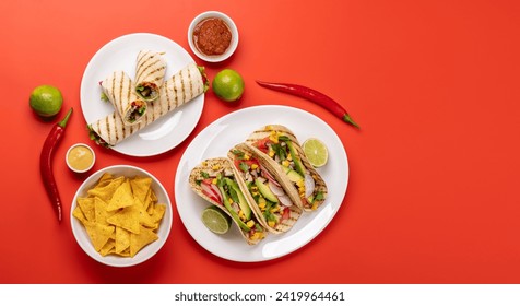 Mexican food featuring tacos, burritos, nachos and more. Flat lay with copy space - Powered by Shutterstock