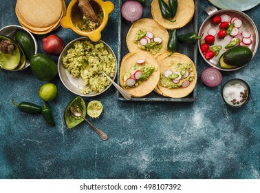 Mexican Food. Fresh Guacamole Salsa With Grill Salmon, Corn Tortilla And Veggies. Copy Space.