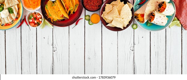 Mexican Food Top Border, Overhead View On A White Wood Banner Background. Quesadilla, Tacos, Nachos And Burritos. Copy Space.