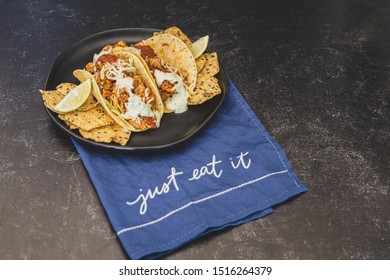 Mexican Fresh Chicken Tacos With Cabbage, Cheese And Cilantro Cream Sauce In A Flour Tortilla With Multigrain Corn Tortilla Chips