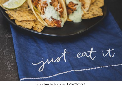 Mexican Fresh Chicken Tacos With Cabbage, Cheese And Cilantro Cream Sauce In A Flour Tortilla With Multigrain Corn Tortilla Chips