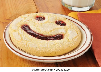 Mexican Galletas Cookie With A Jam Smiley Face On It