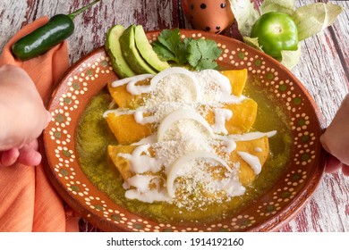 Mexican Green Enchiladas With Sour Cream And Cheese 