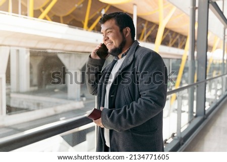 Similar – Image, Stock Photo Confident businessman in Madrid with modern backdrop