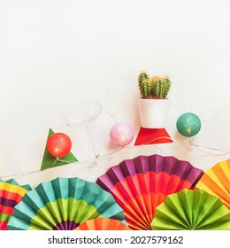 Mexican Holidays Blank With Colorful Paper Fans, Lightening And Cactus On A White Background With Place For Text. Mexican Party Blank Suitable For A Greeting Card And Invitations 