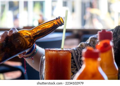 A Mexican Michelada with dark beer