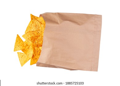 Mexican Nachos Chips Spill Out Of The Large Package  Isolated On White Background With Clipping Path. Packaging Of Nachos Chips On White Background. Bag Or Packet Mexican Nachos Chips.