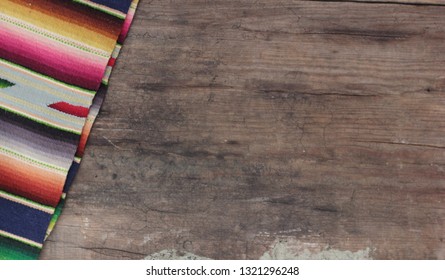 Mexican Poncho Serape Background Fiesta Cinco De Mayo Wooden Copy Space Stripe Pattern. Sarape, Traditional Crafts From Saltillo, Mexico.