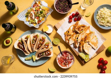 Mexican Sharing Food with Tacos, Nachos and Black beans - Powered by Shutterstock