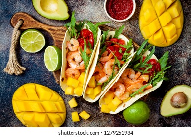 Mexican Shrimp Tacos With Avocado, Tomato, Mango Salsa On Rustic Stone Table. Recipe For Cinco De Mayo Party. Top View, Overhead, Flat Lay. 