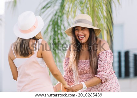  Mexican sisters smiling on summer vacation