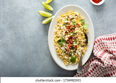Mexican street corn, elote with cotija cheese, fresh cilantro and chili