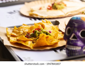 Mexican Street Fast Food With Tacos, Fajitas And Nachos. Chef Preparing Food In Truck. Selective Focus