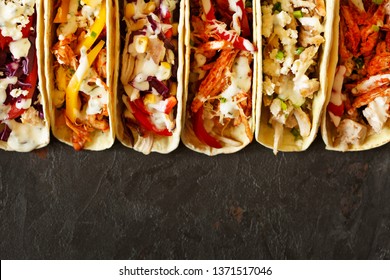 Mexican Street Food. Varied Traditional Mexican Corn Tacos Flat Lay Composition.