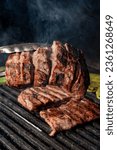 mexican style carne asada, charcoal grill for grilling arrachera and sirloin style meat, carne asada from northern mexico, carne asada tacos from sonora, traditional mexican food.