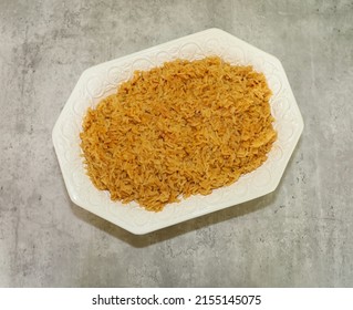 Mexican Style Rice Also Known As Spanish Rice Served On Serving Bowl.