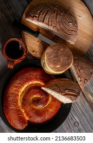 Mexican Sweet Bread Or Artesian Bread Traditional From Oaxaca, With A Clay Cup Of Black Coffee, Top View, Flat Lay Overhead View Horizontal