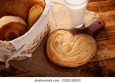 Mexican sweet bread "oreja" made with puff pastry, its name comes from its shape similar to that of ears, of French origin, where it is known as Elephant Ear or Palmier Puff Pastry - Powered by Shutterstock