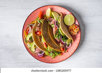 Mexican Tacos With Beef, Vegetables And Salsa. Tacos Al Pastor On White Rustic Background. Top View. Copy Space