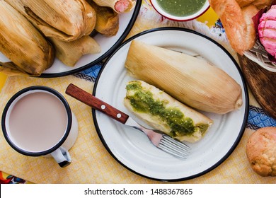 mexican tamal of corn leaves with chili and green sauce, Tamale in Mexico