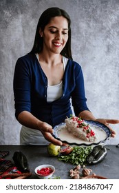 Mexican Woman Cooking Chiles En Nogada Recipe With Poblano Chili And Ingredients, Traditional Dish In Mexico