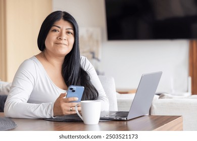 Mexican woman working at home business woman entrepreneur