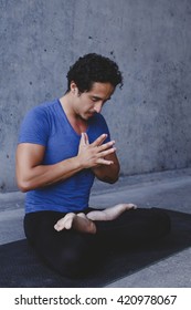Mexican yoga teacher meditating