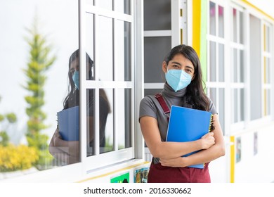 Mexican Young Teacher Wearing Face Mask On Back To School After Coronavirus Pandemic 