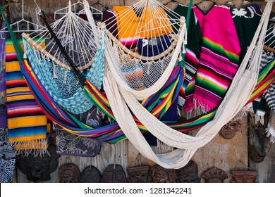 Mexico, Bahia De Banderas, Bucerias. A Beach Town In Nayarit State Between La Cruz De Huanacaxtle And Nuevo Vallarta. Hammocks. Bright Colored Blankets. (Mexican Saltillo Sarape Blanket) .