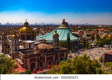 Mexico. Basilica of Our Lady of Guadalupe. The old and the new basilica, cityscape of Mexico City on the far